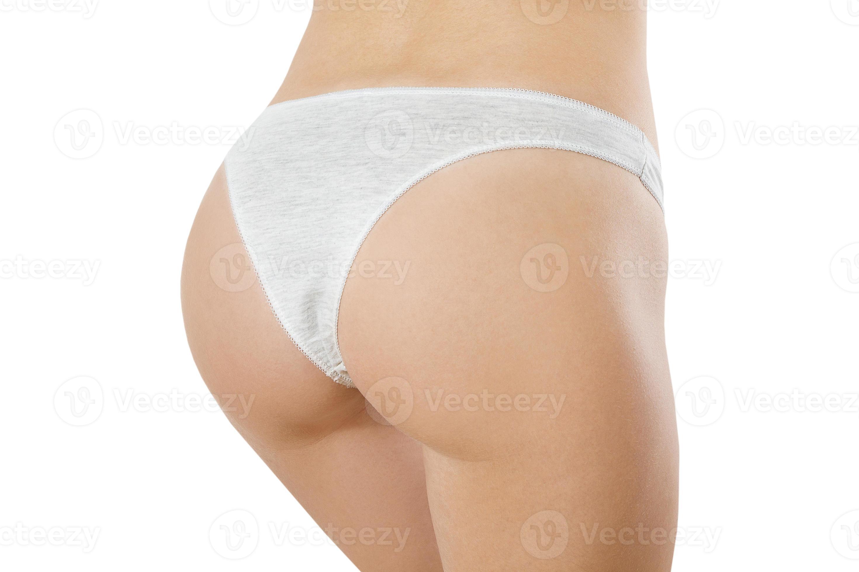 Butt lift and anti cellulite woman body concept. Bikini white panties on  female close up isolated on white background. Plastic surgery and  liposuction. Cropped image. Skin care and bodycare. Healthy 13936393 Stock