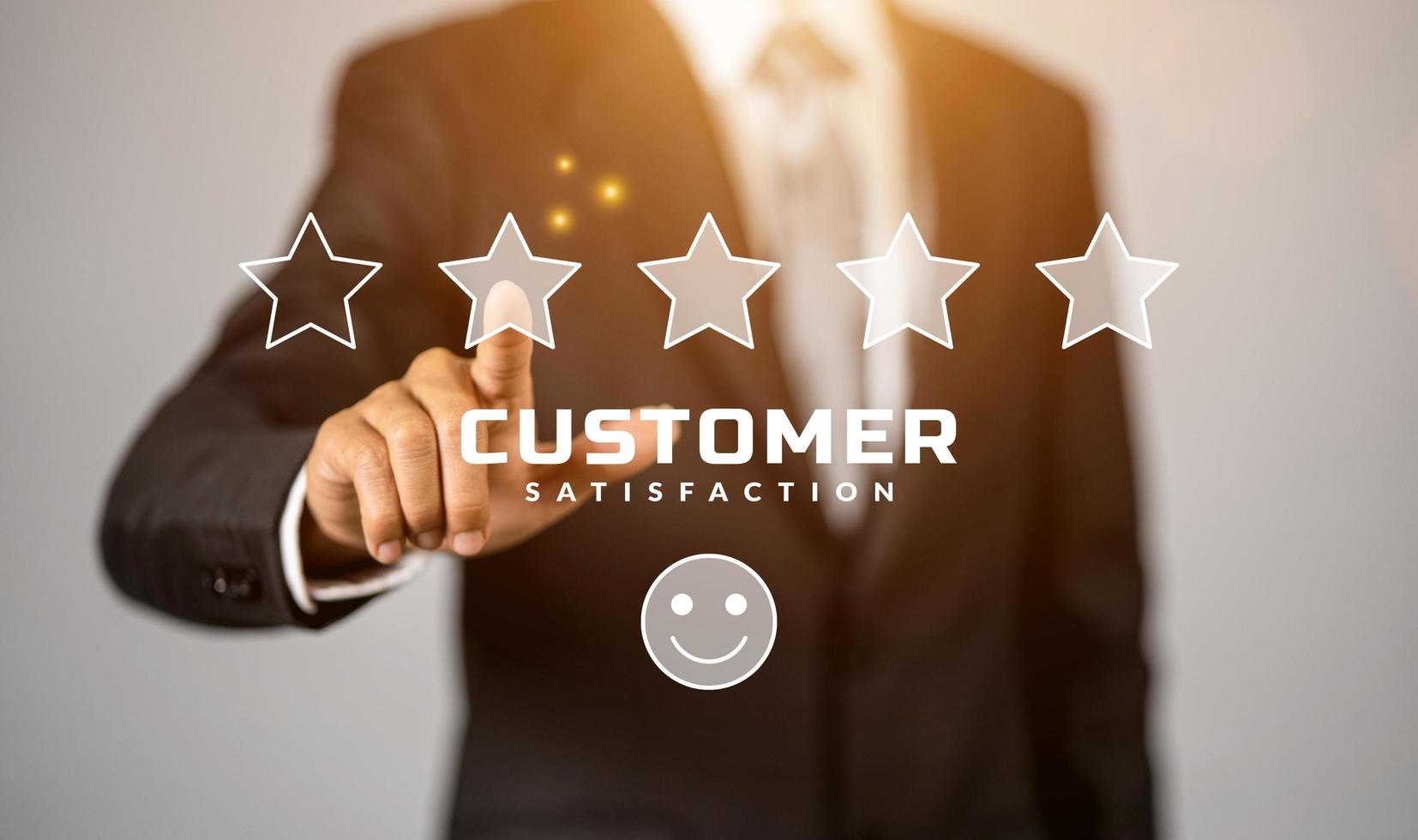 Businessman giving rating with hand touching virtual screen, Customer Experience concept, Customer service and satisfaction feedback concept. photo