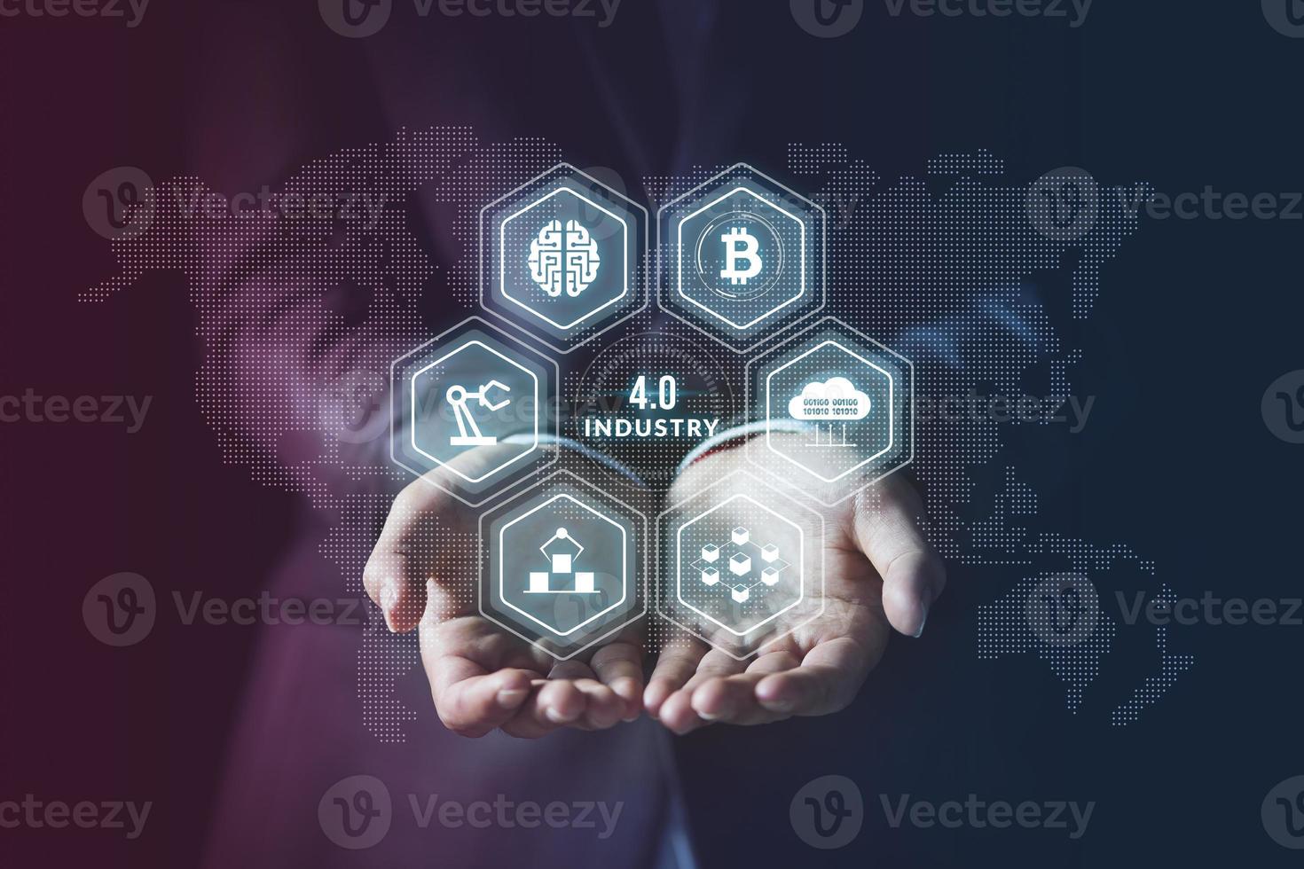 Businessman showing virtual industry 4.0 concept, IoT, automation monitoring system. Robotics and digital manufacturing operation industrial technology, Global futuristic automatic technology concept. photo