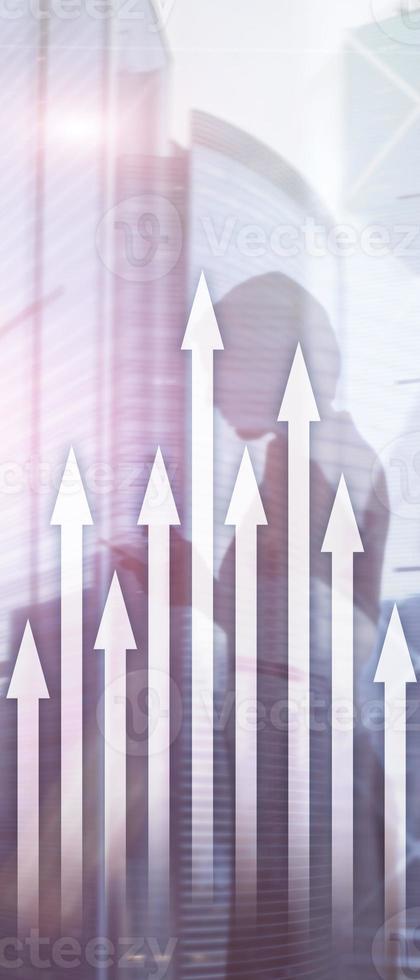 Vertical Panorama Banner. Up arrow graph on skyscraper background. Invesment and financial growth concept. photo