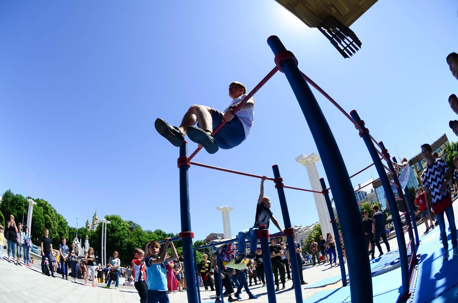 KHARKIV, UKRAINE - 27 MAY, 2022 Street workout show during the annual festival of street cultures photo