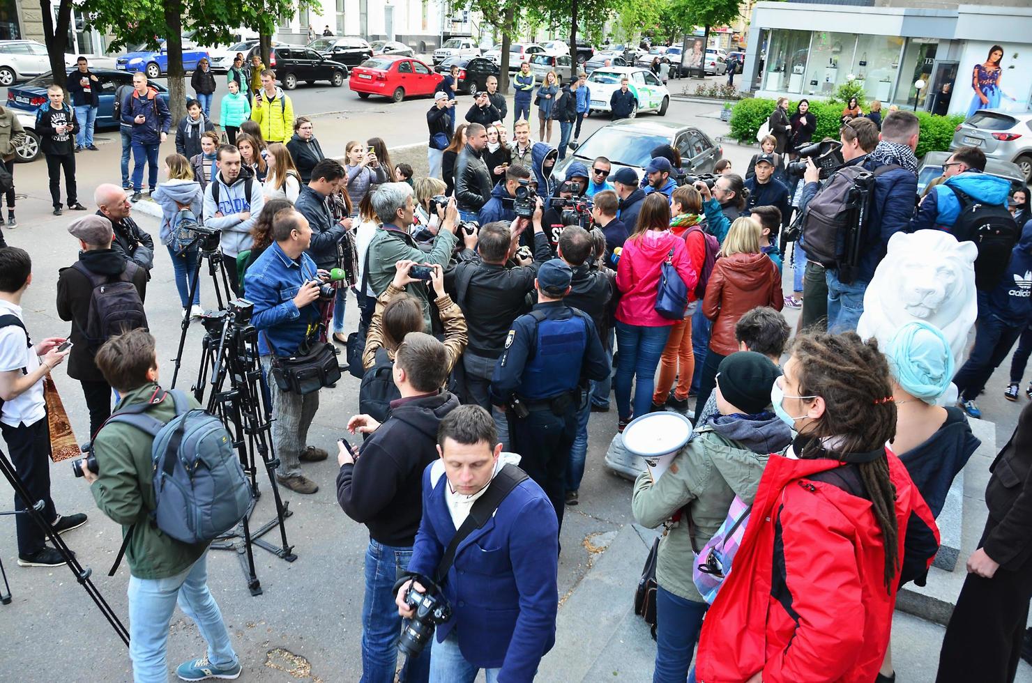 KHARKOV, UKRAINE - MAY 17, 2022 The organization of Ukrainian Nazis and Eastern Corps patriots disrupts the first LGBT action in Kharkov. Hooligans and ultras against the existence of minorities photo