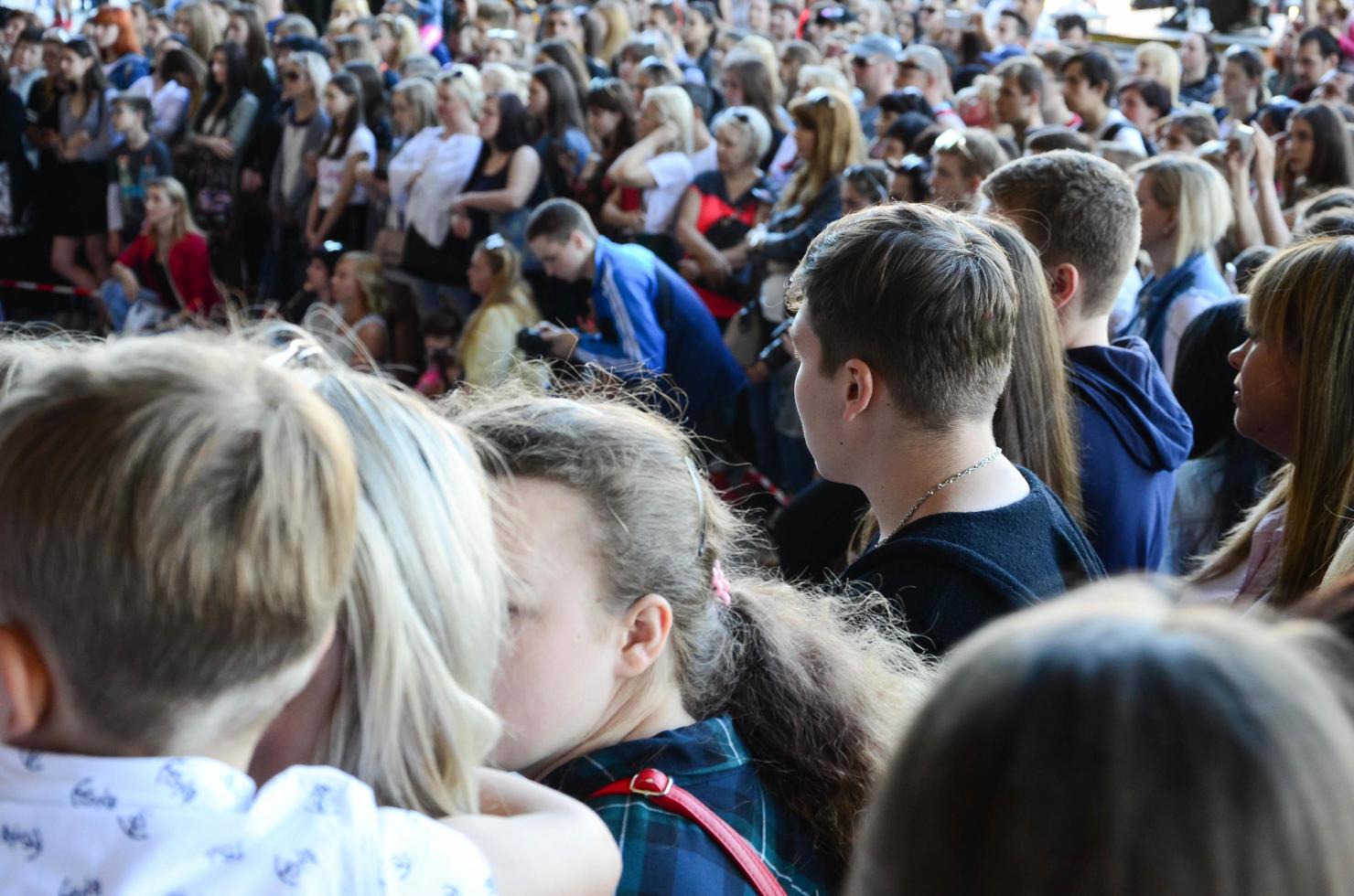 KHARKOV. UKRAINE - MAY 2, 2022 Crowd of people as a spectators during the annual festival of street cultures photo