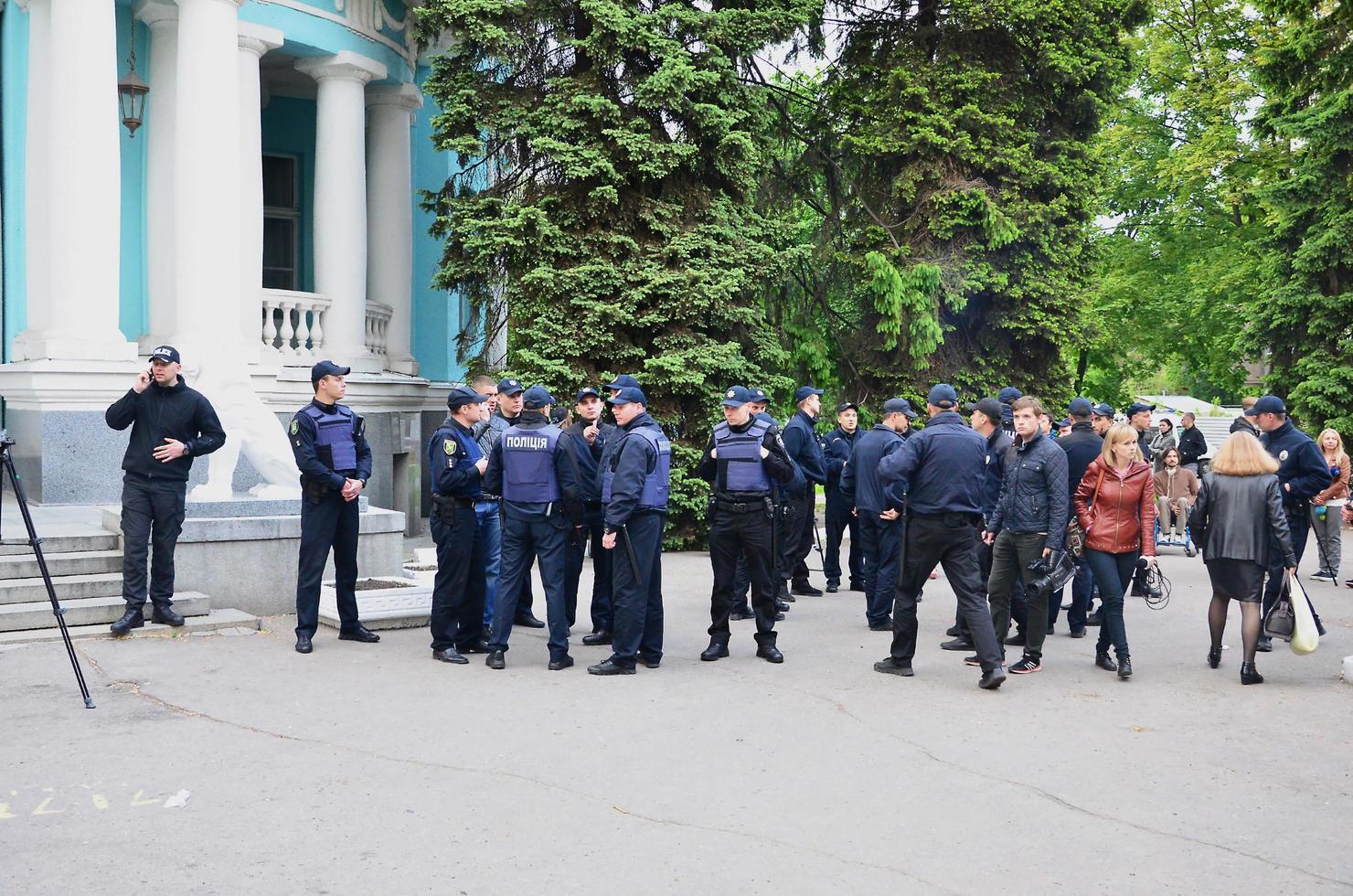 KHARKOV. UKRAINE - MAY 17, 2022 Ukrainian policemen who provide security to LGBT activists and protect them from attacks by Kharkov's Nazis and ultras photo