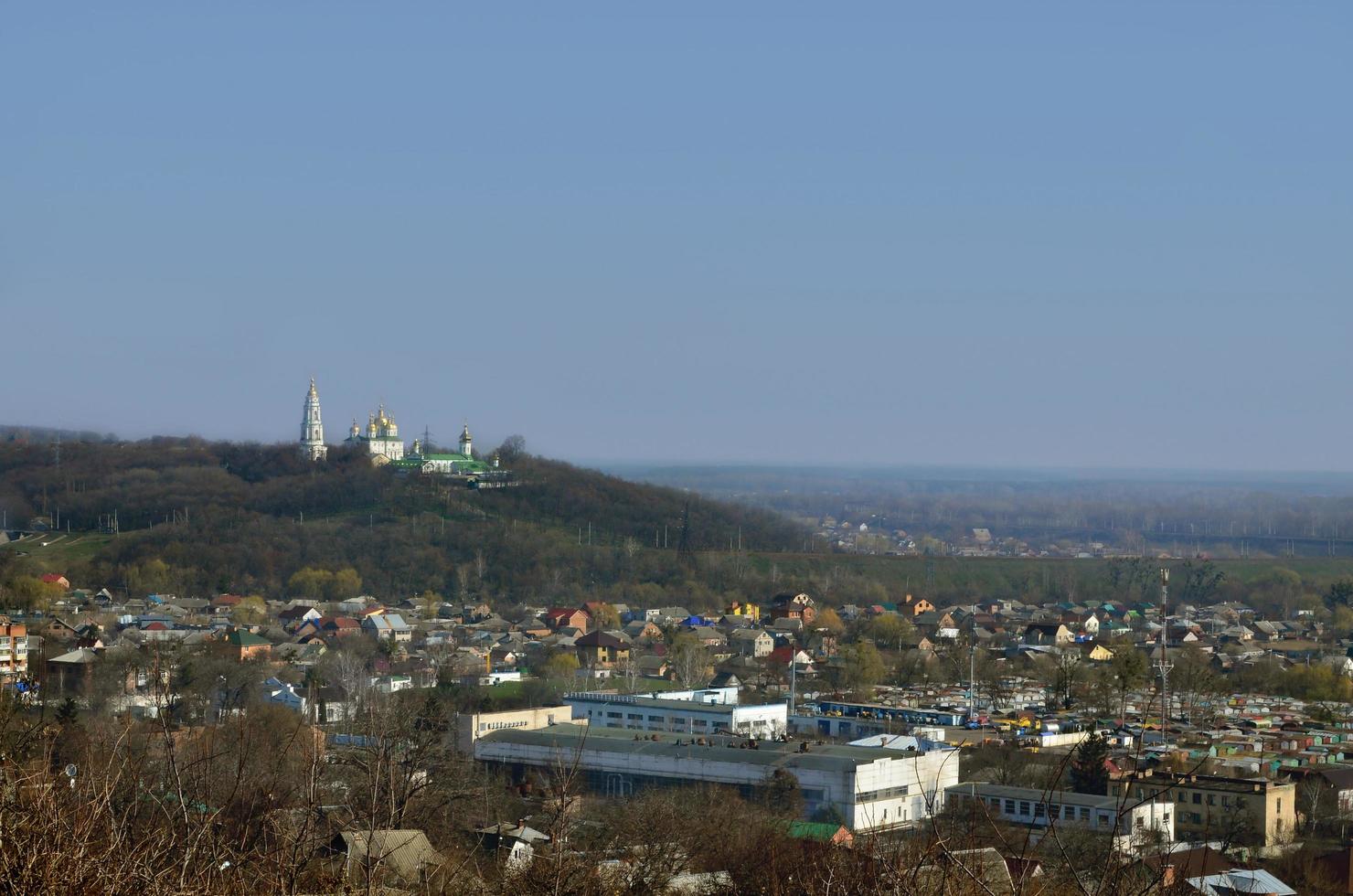POLTAVA. UKRAINE - MAY 4, 2022 The Holy Cross Exaltation Monastery over the Poltava city photo