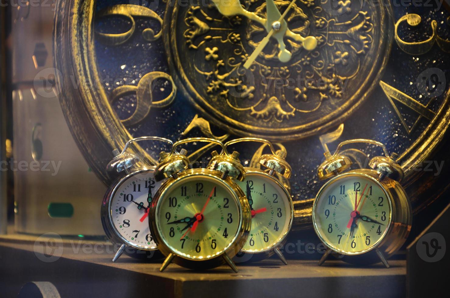 Abstract image with mechanical clocks of unusual and strange design. Metal composition, like a clockwork photo