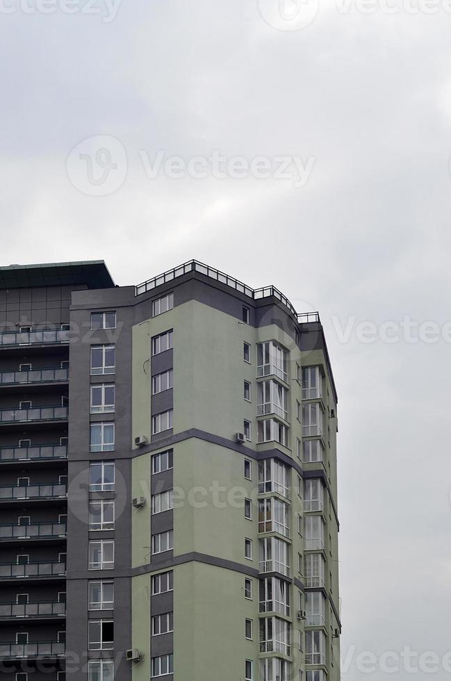 Multi-story office building with blue sky photo