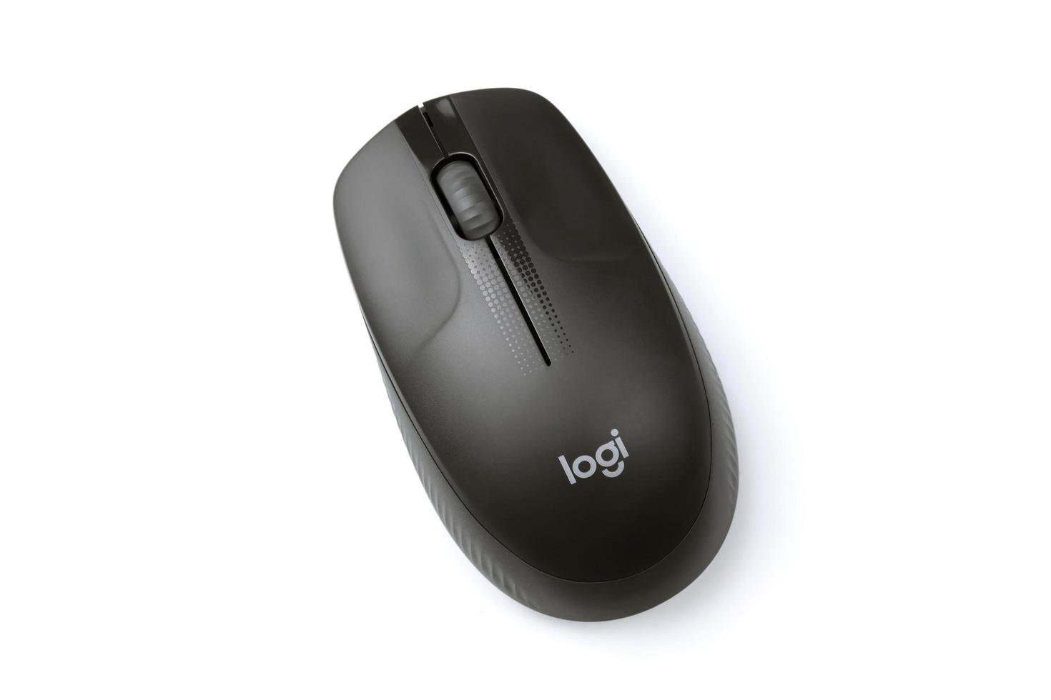 KHARKOV, UKRAINE - MAY 5, 2022 Logitech wireless mouse on white background. Logitech is a Swiss multinational manufacturer of computer peripherals photo