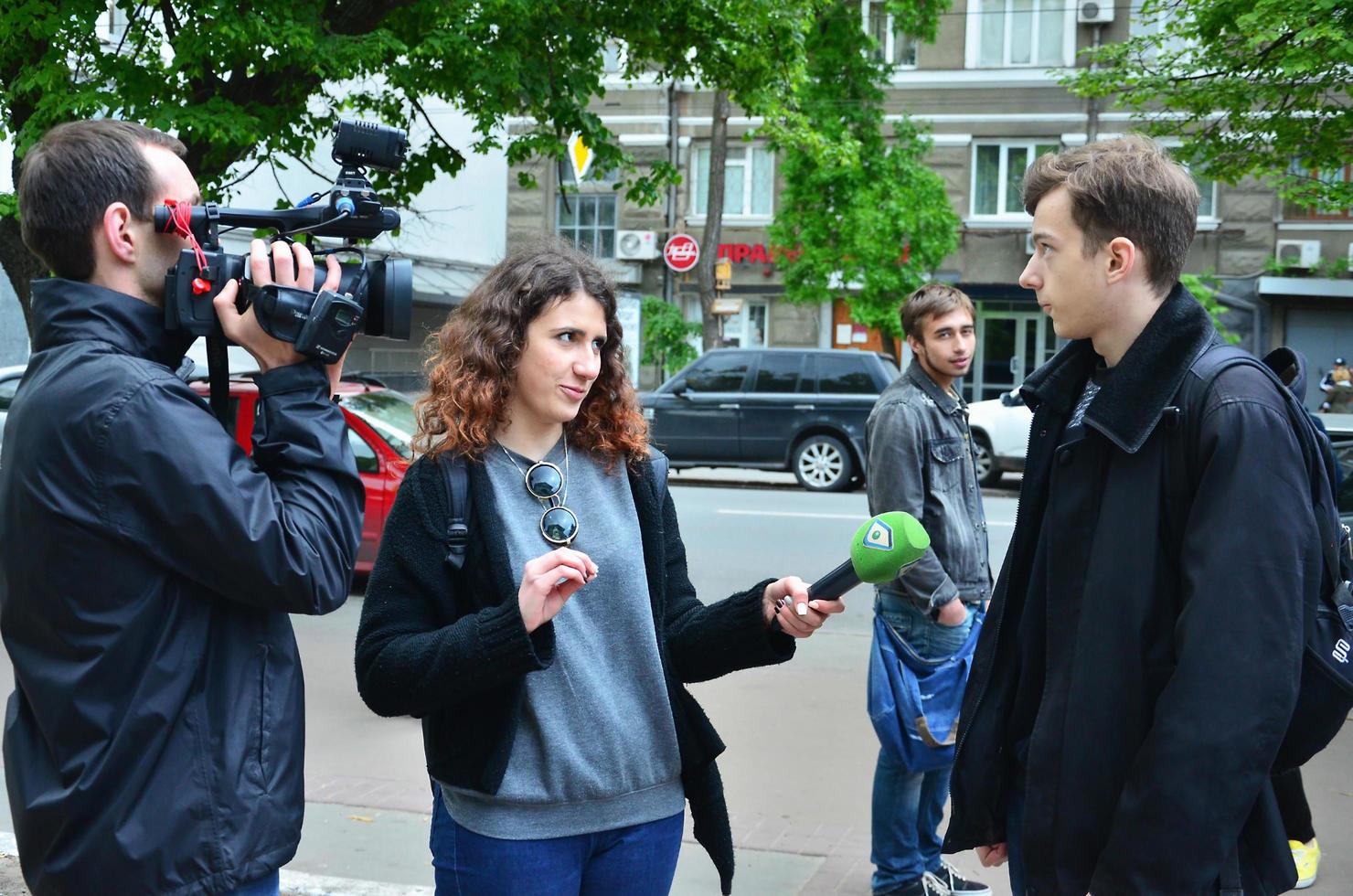 KHARKOV. UKRAINE - MAY 17, 2022 Participants of the first LGBT action in Kharkov give interviews about an unexpected attack and disruption of the event photo