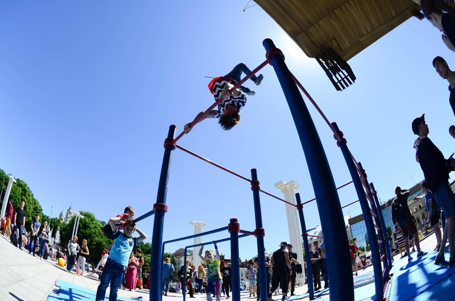 KHARKIV, UKRAINE - 27 MAY, 2022 Street workout show during the annual festival of street cultures photo