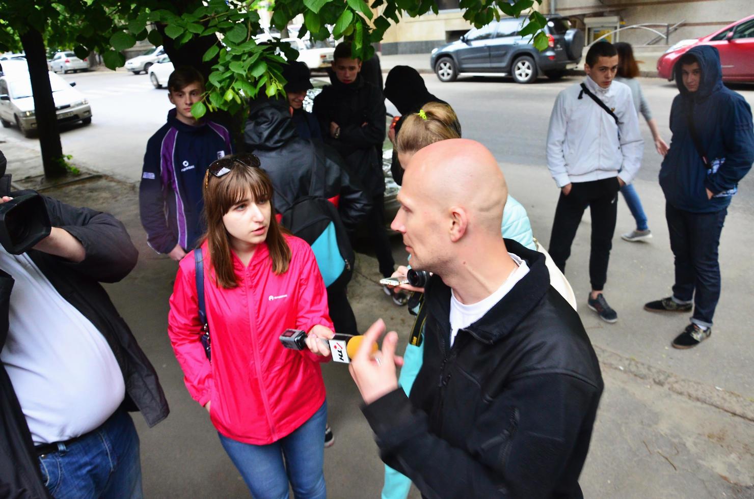 KHARKOV. UKRAINE - MAY 17, 2022 Participants of the right-wing Nazi and patriotic movement give interviews on the forced cessation of the first LGBT action in Kharkov photo
