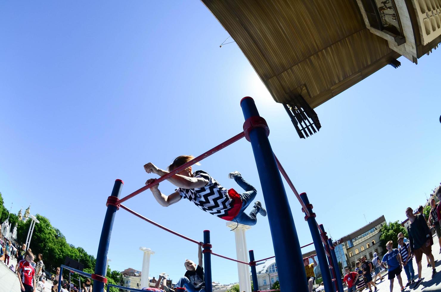 KHARKIV, UKRAINE - 27 MAY, 2022 Street workout show during the annual festival of street cultures photo