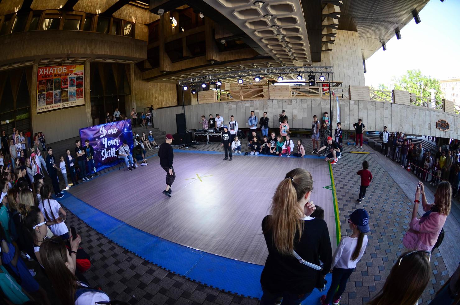 KHARKOV. UKRAINE - MAY 2, 2022 Dance battle on the festival of street cultures. Break dance and hip-hop children and teenagers photo