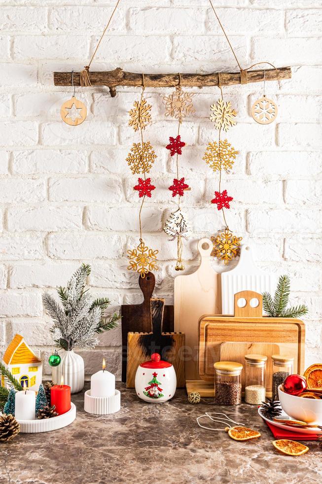 the concept of New Year's decor of a modern kitchen in light colors. front  view of the countertop with kitchen utensils and decorations 13941444 Stock  Photo at Vecteezy