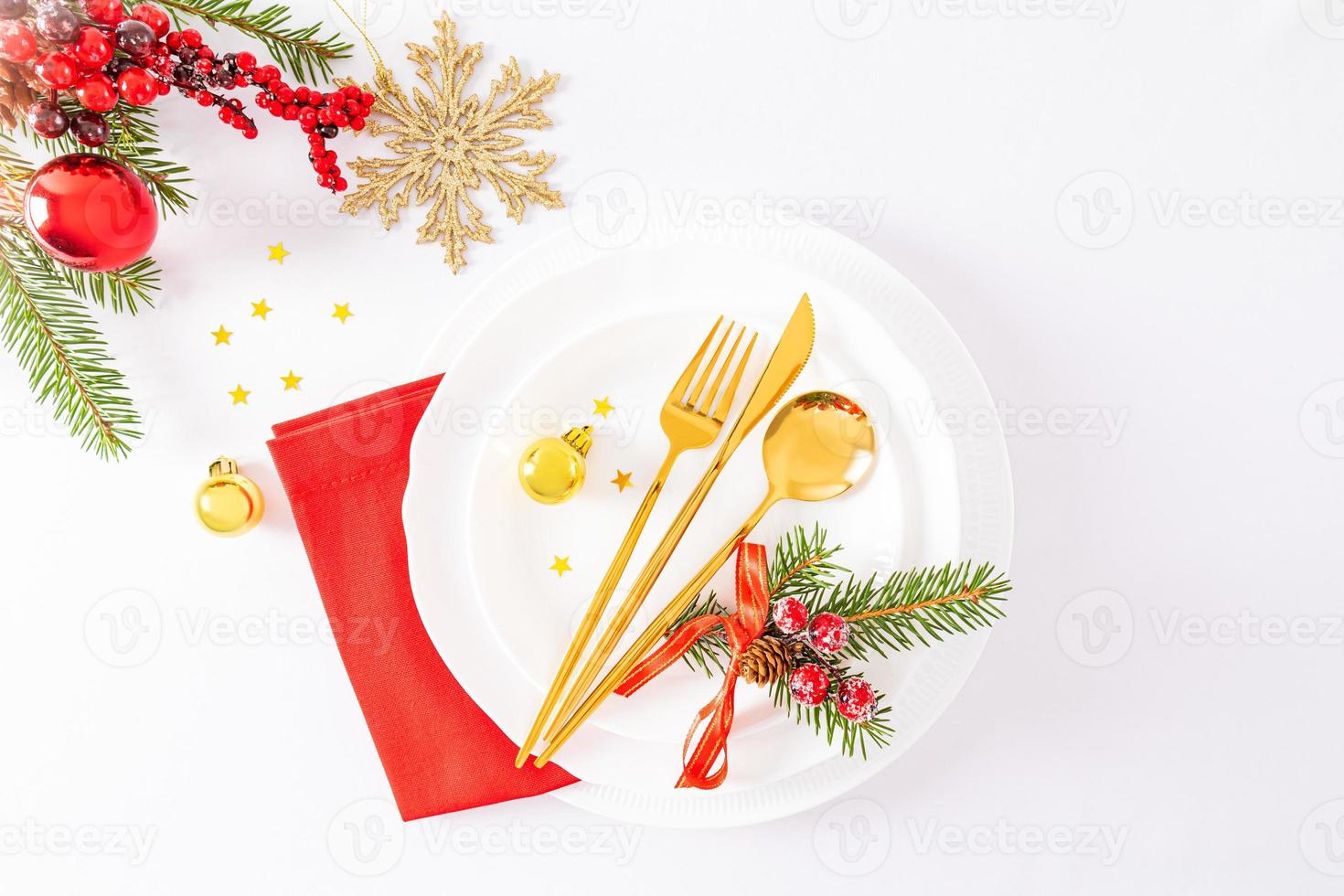 top view of the winter festive table with serving in the classic style of celebrating the New Year. Christmas decorations . background layout. photo