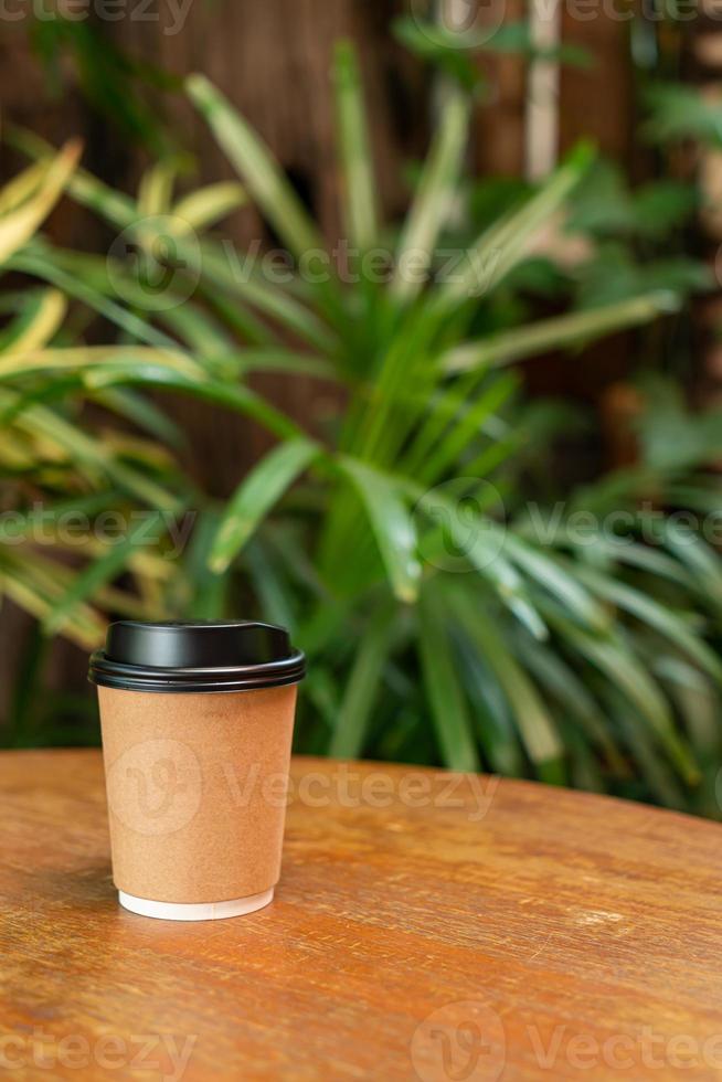hot coffee cup on wood table photo