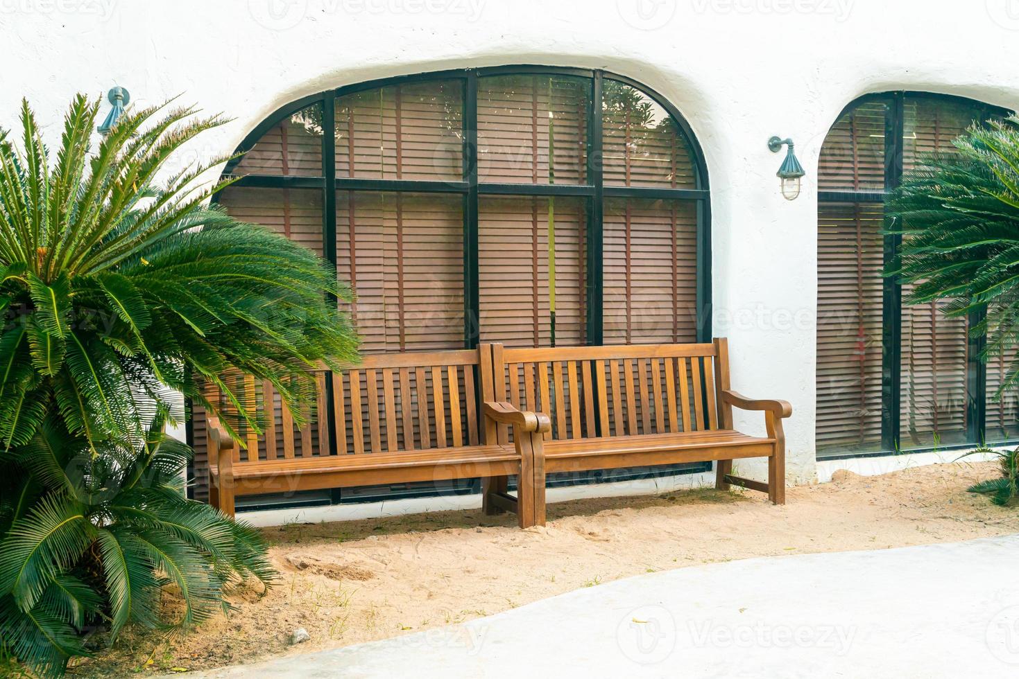 empty bench with tree in garden photo