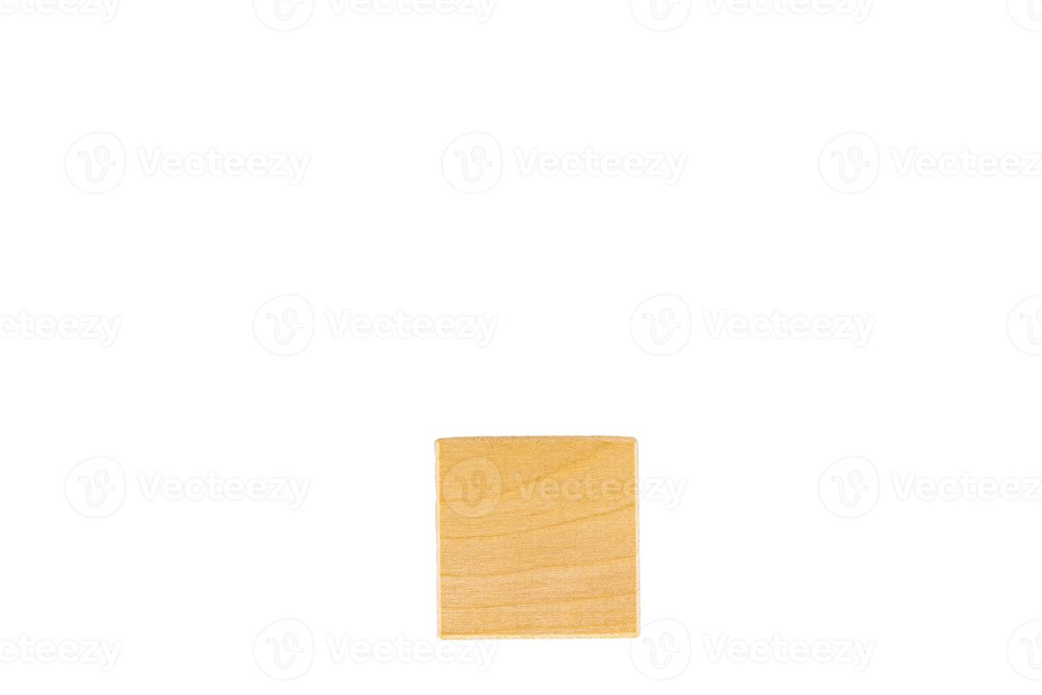 One wooden cube, brown. White isolated background. Concept for writing text. photo
