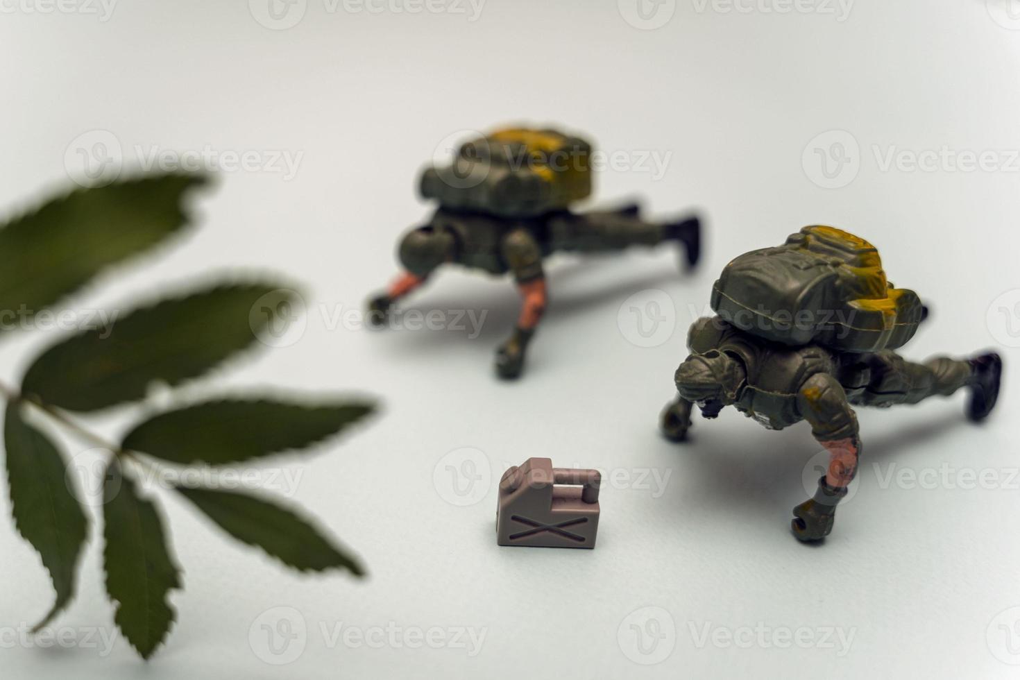 Creative composition, soldiers do push-ups , army soldiers in full gear undergo heavy training and do push-ups photo