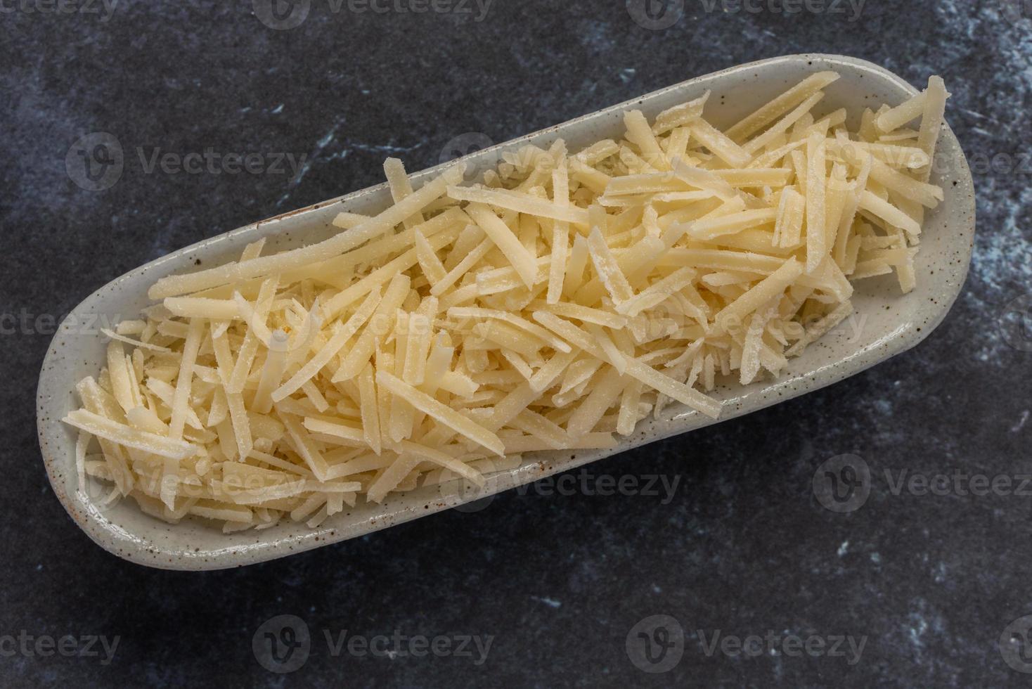 queso parmesano rallado en un arco foto