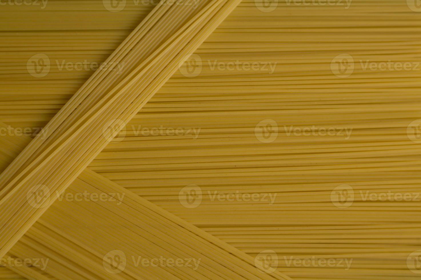 comida de cocina italiana de pasta de espagueti. fondo de comida de espagueti largo amarillo foto
