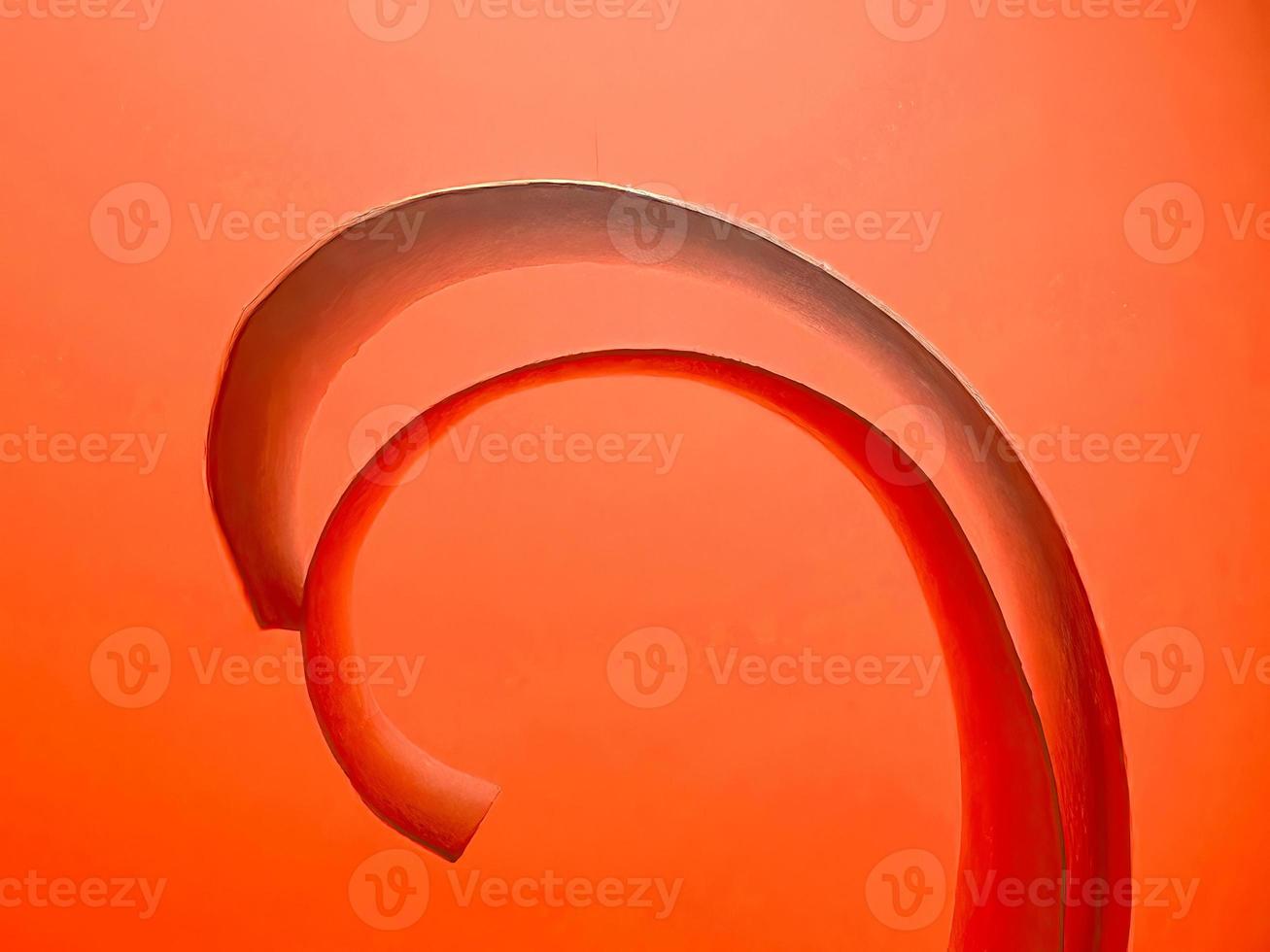 vibrant colourful red paper spiral ribbon high quality image or photograph photo
