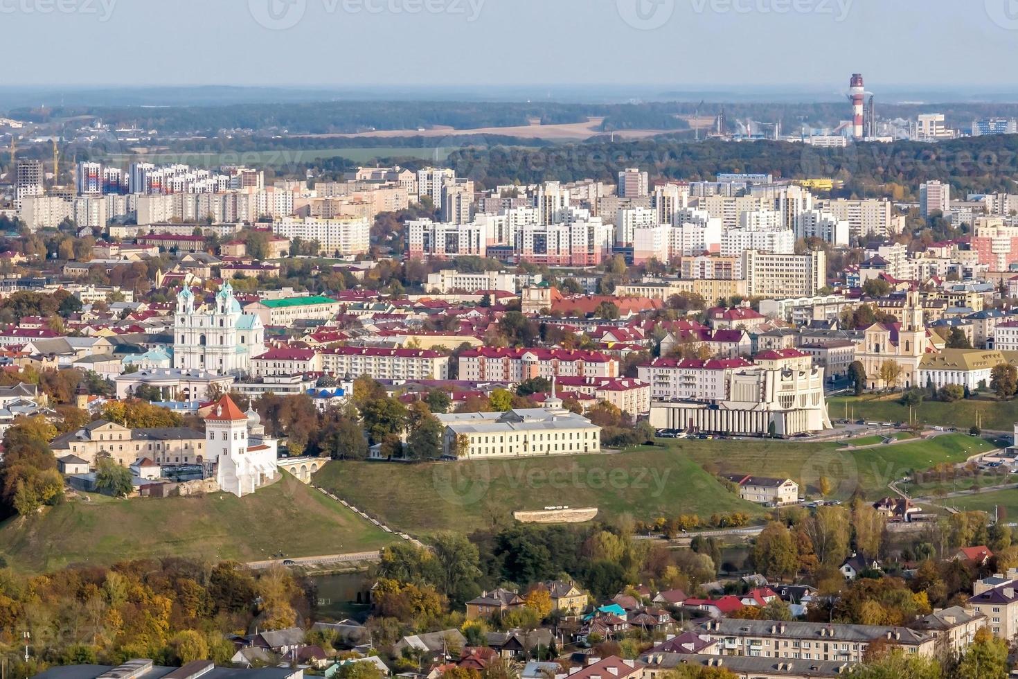 aerial panoramic view from height of a multi-storey residential complex and urban development in autumn day photo