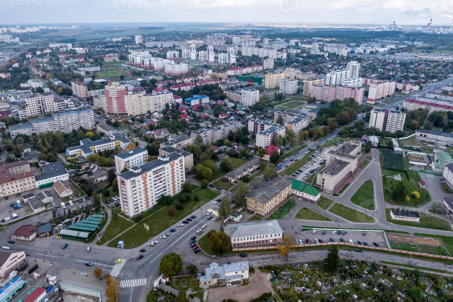 aerial panoramic view from height of a multi-storey residential complex and urban development in autumn day photo