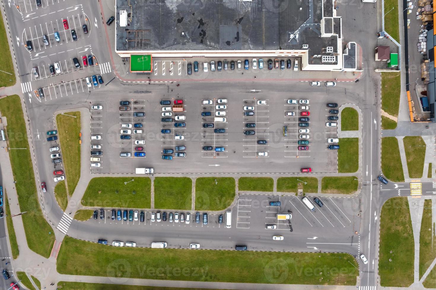 aerial view on large open air parking lot for cars for residents of area photo