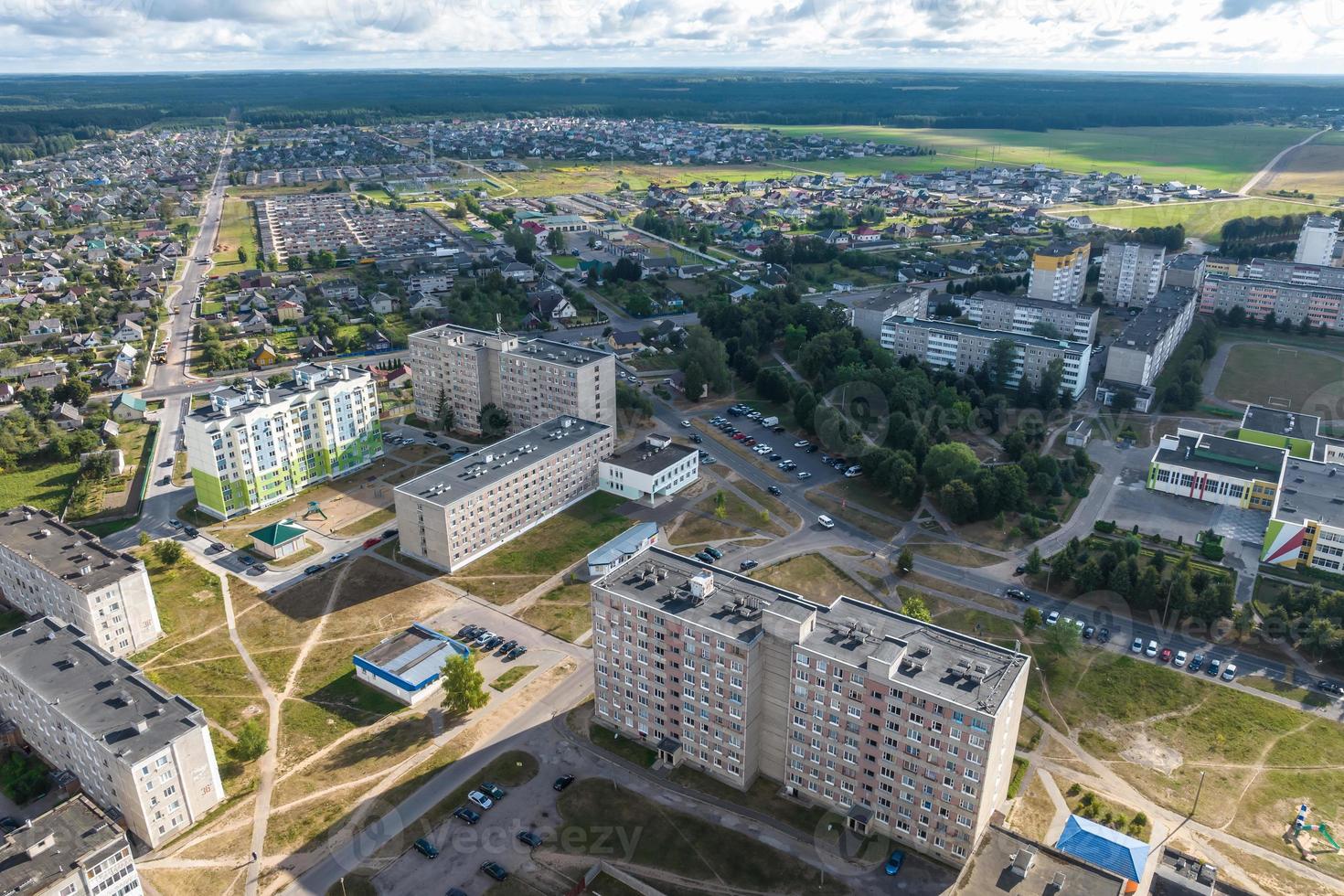 aerial panoramic view from height of a multi-storey residential complex and urban development in autumn day photo