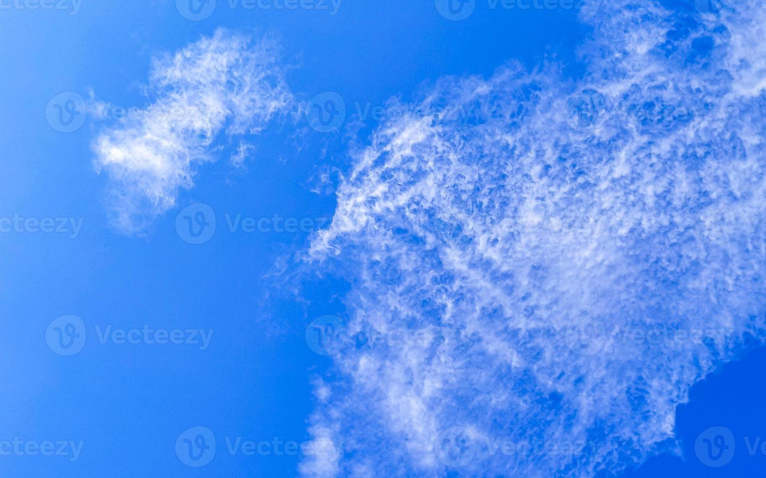 Blue sky with chemical clouds chemical sky chemtrails chemtrail. photo