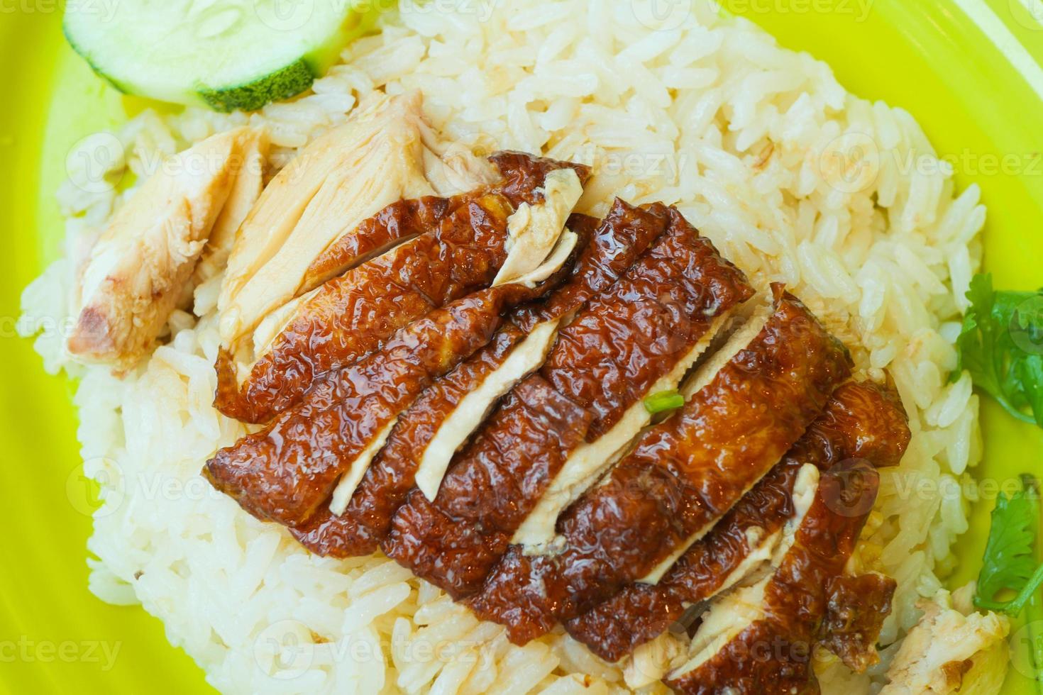 singapore chicken meat and rice on a plate photo