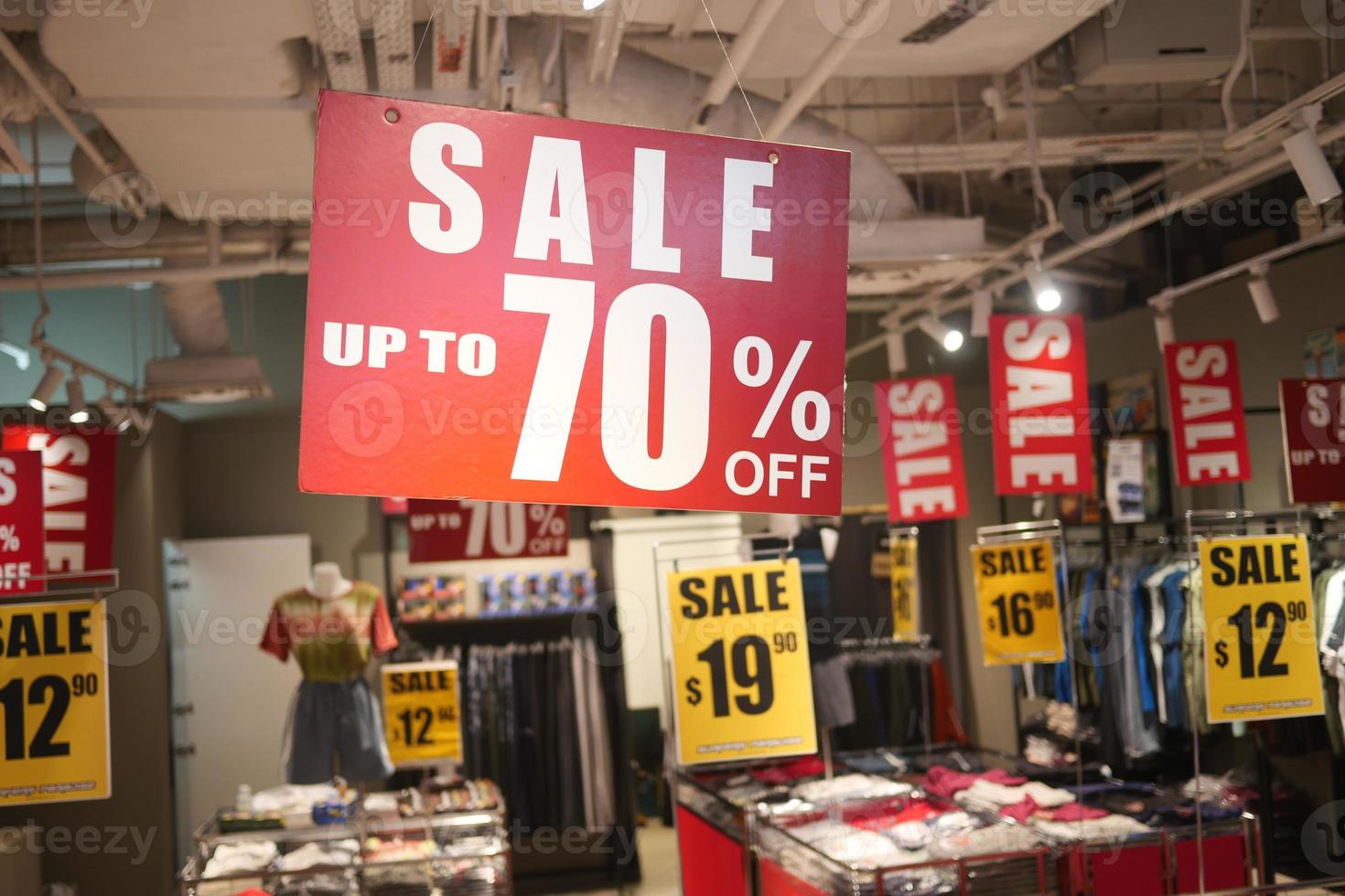 Close up of sale sign in a closing store. photo