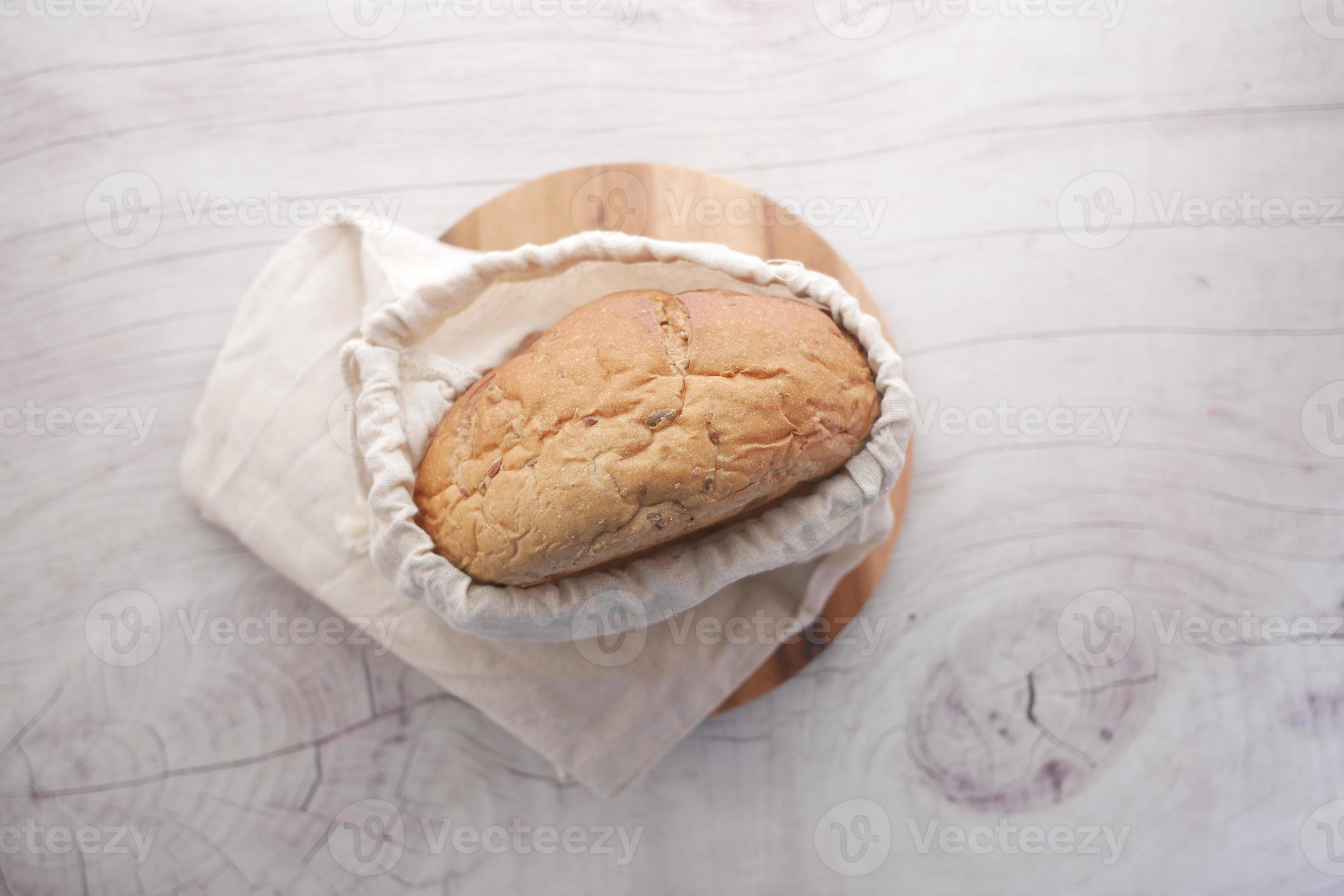 baked bread stored in a reusable linen bag . Eco friendly Zero waste
