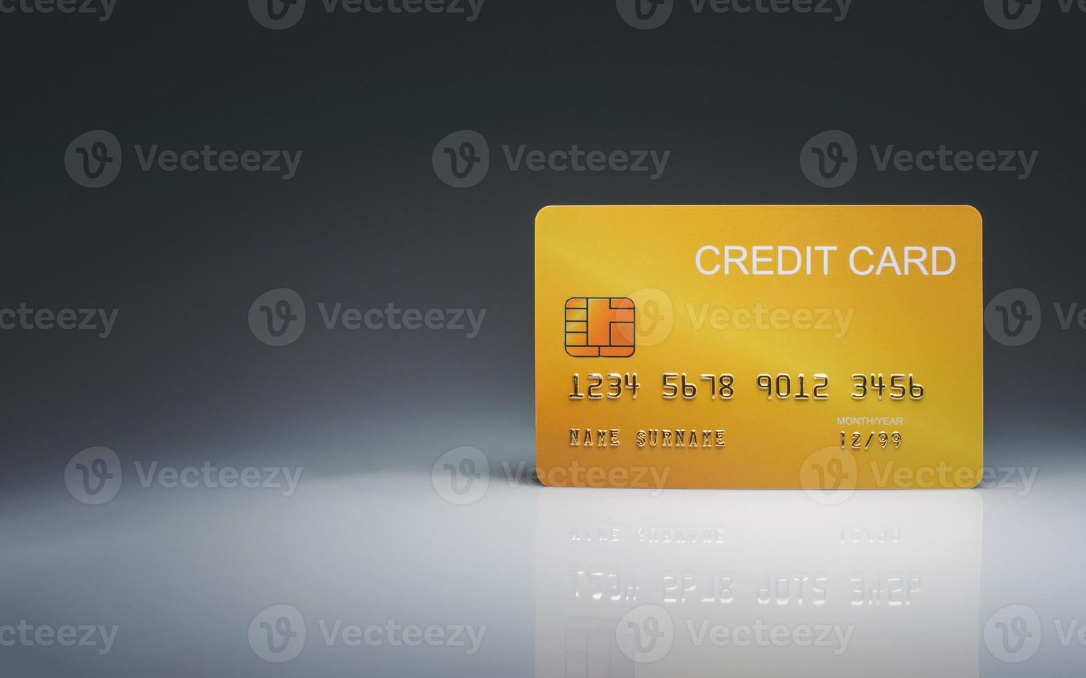 Mock credit card isolated on light and shadow background. Shopping concept. cashless spending concept photo