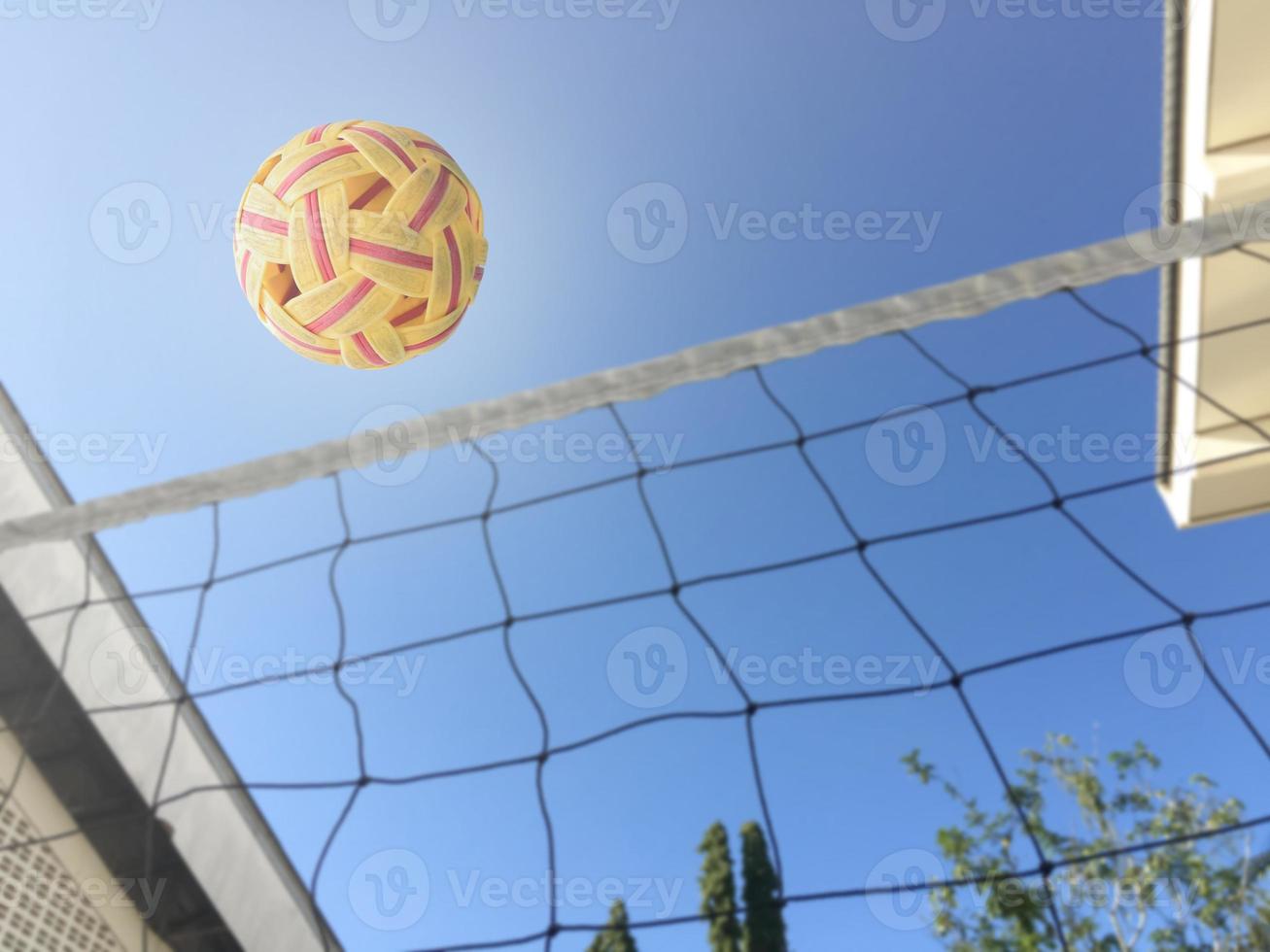 Sepak takraw ball, popular sport of southeast asian countries, soft and  selective focus, outdoor sport and recreational activity concept. photo