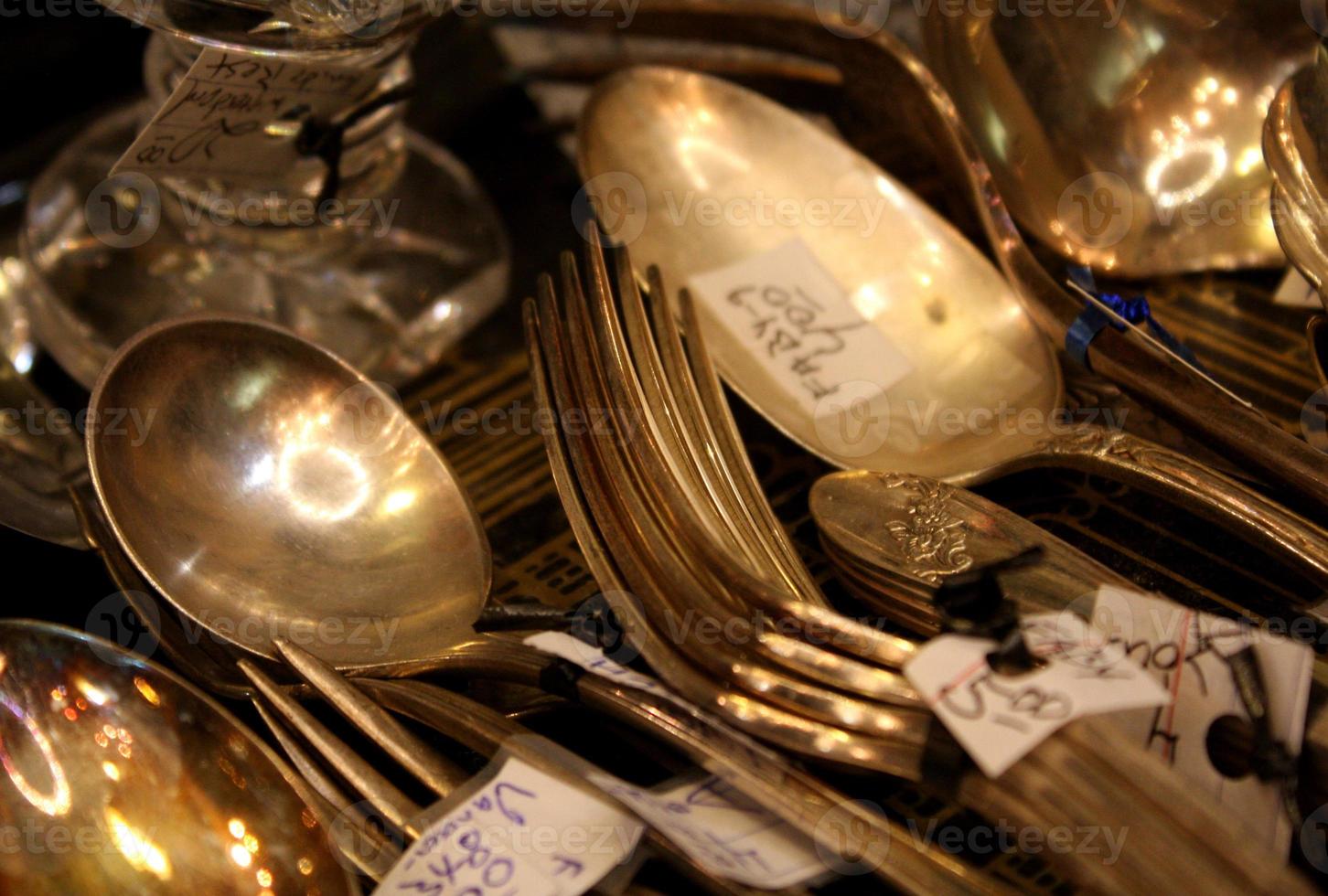 A Collection of Antique Silverware at a Thrift Store photo