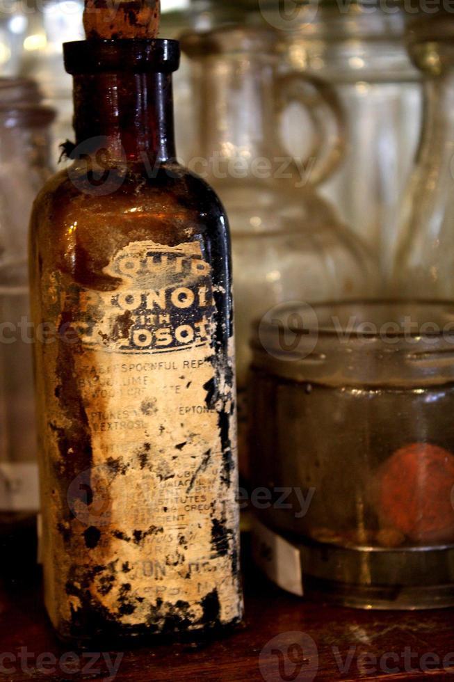Vintage Distressed Glass Medicine Bottle photo