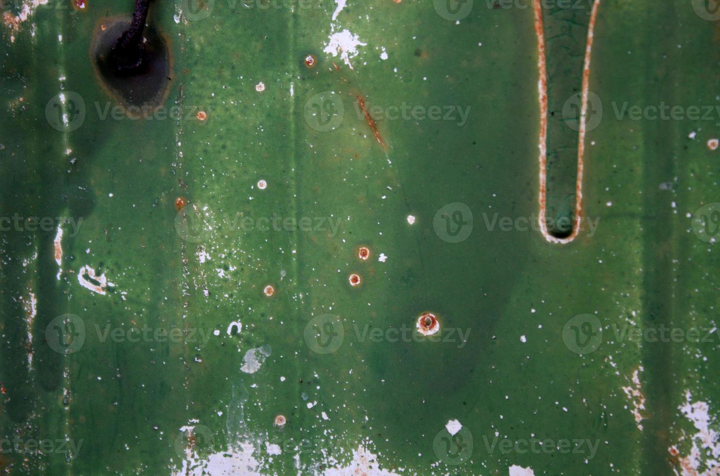 Distressed Green Painted Metal Background Texture photo