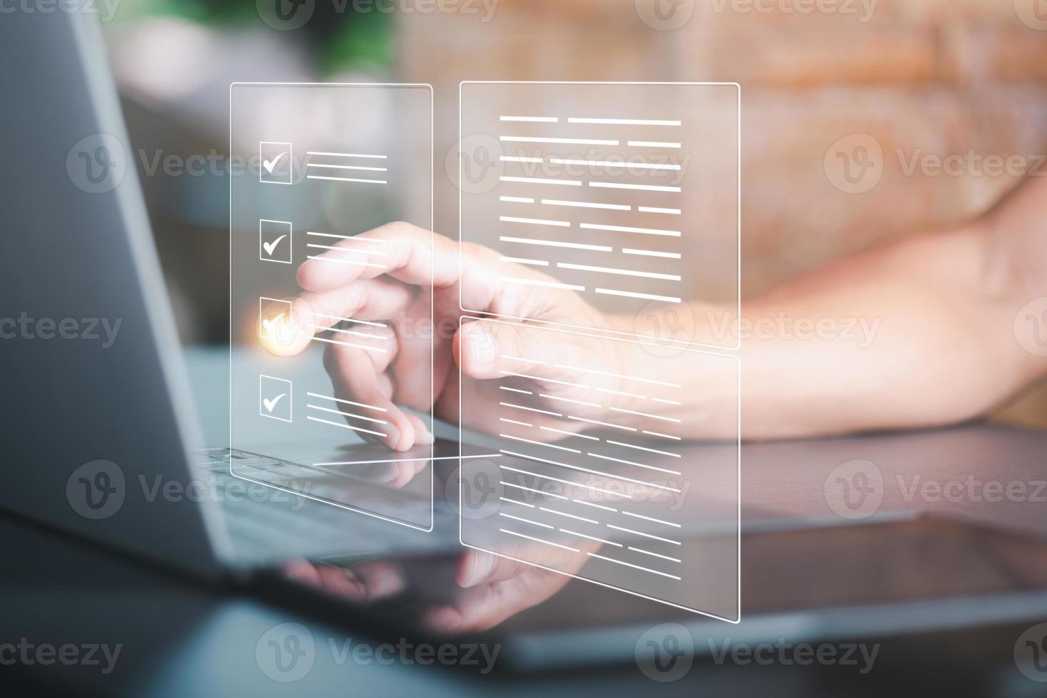 Businessman marks and checks documents online via laptop Concept of rules, rules and policies, company regulations. Terms and Conditions, and Legal Policies on Virtual Screens photo