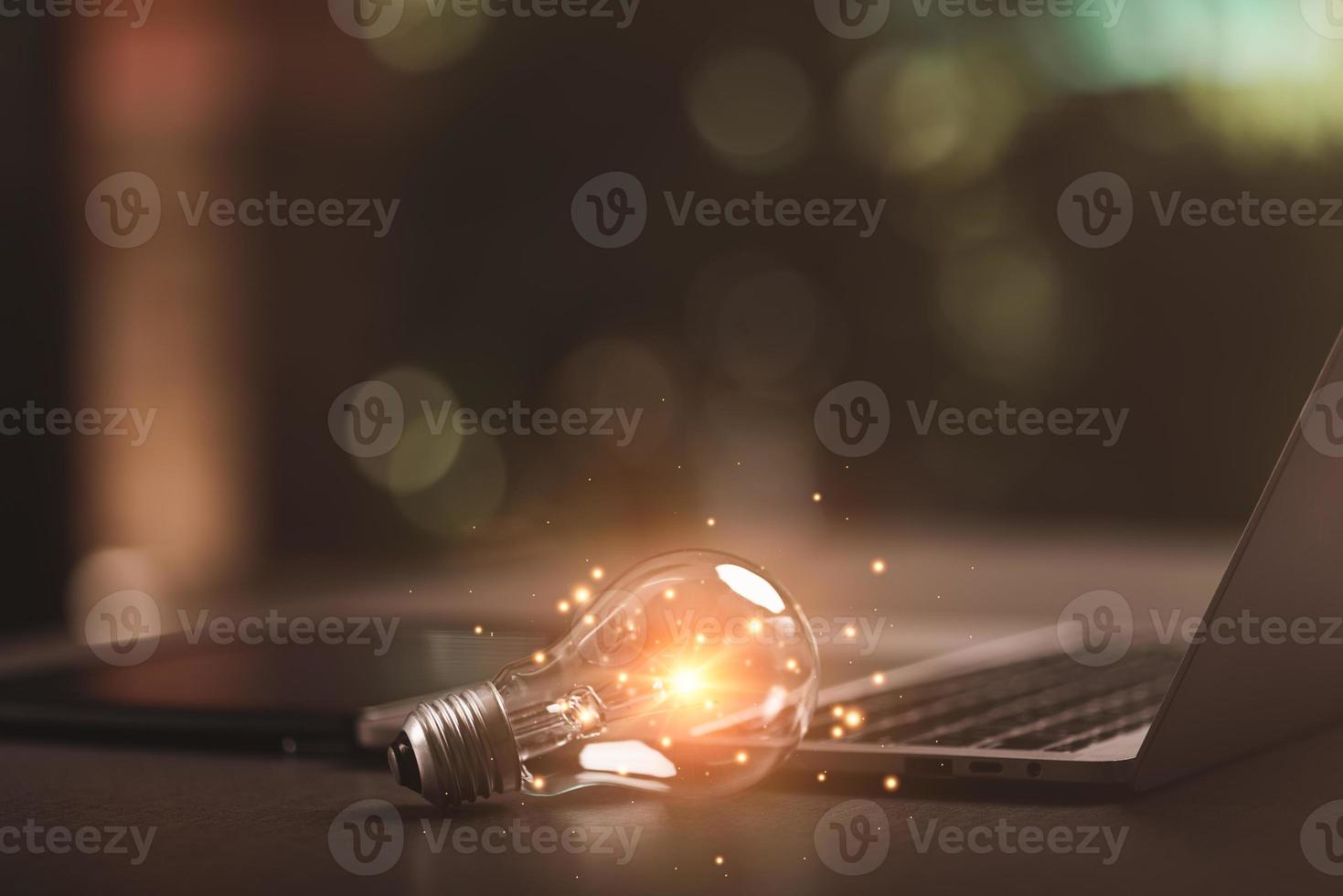 innovative technology in science and communication concepts,Technology creativity for future inventions and developments,Business for innovative solution concept,the light bulb is on the desk photo