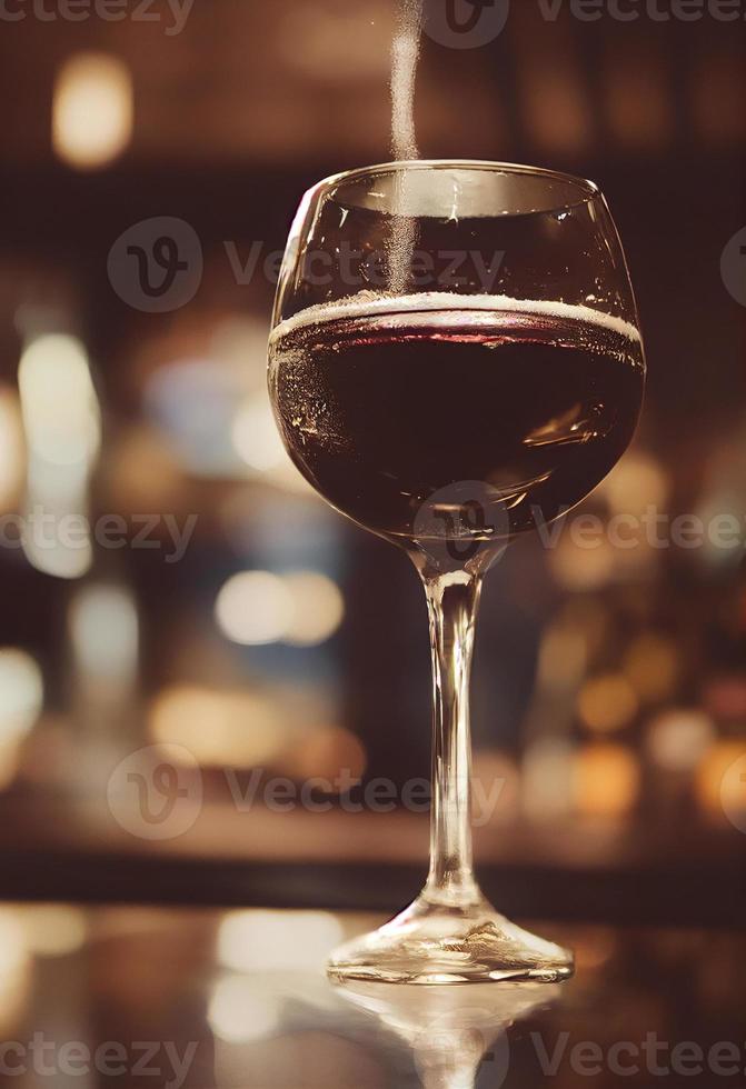 Glass of dark red wine in a pub on a reflective surface photo