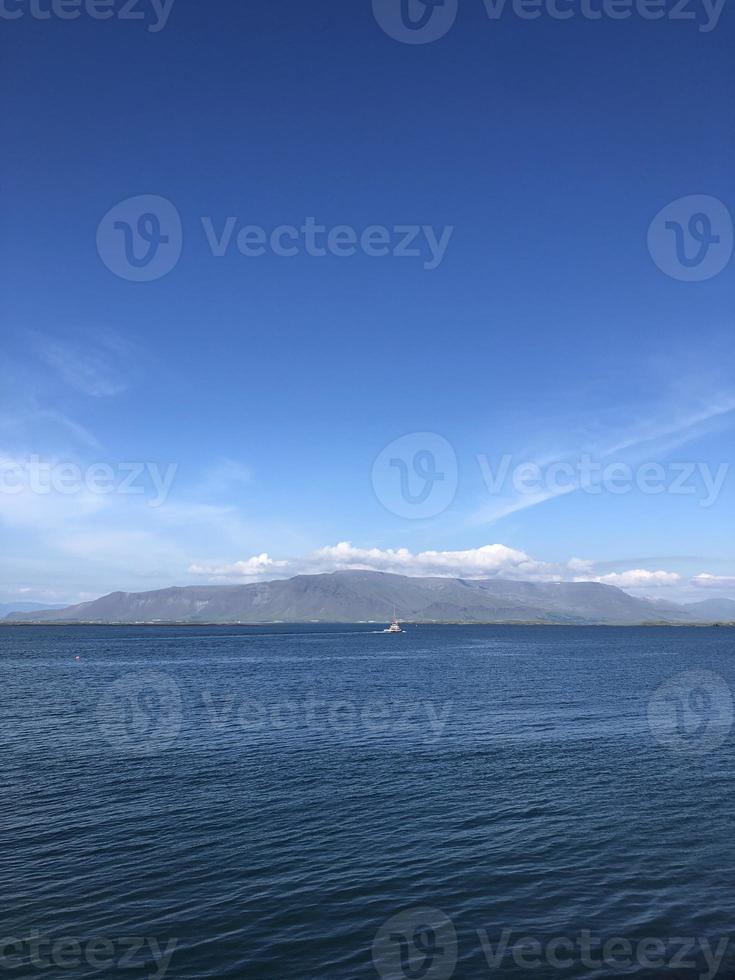 The coast of Reykjavik, Iceland, on a sunny day photo