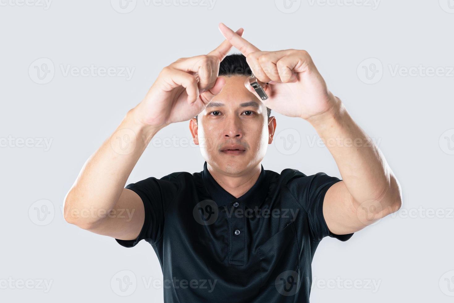 Football referee showing VAR symbol. photo