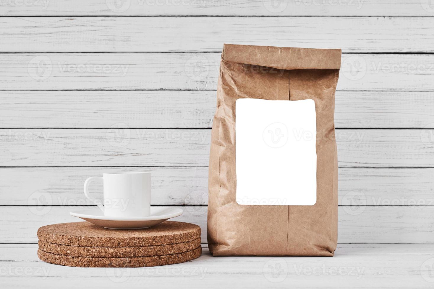 Craft paper bag on white background, copy space photo