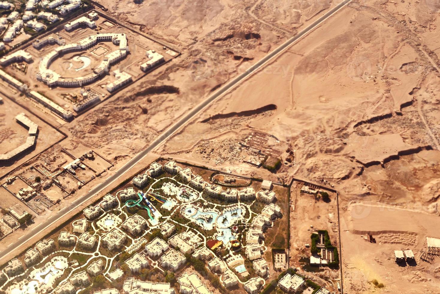 Aerial view of a city scape from airplane window photo