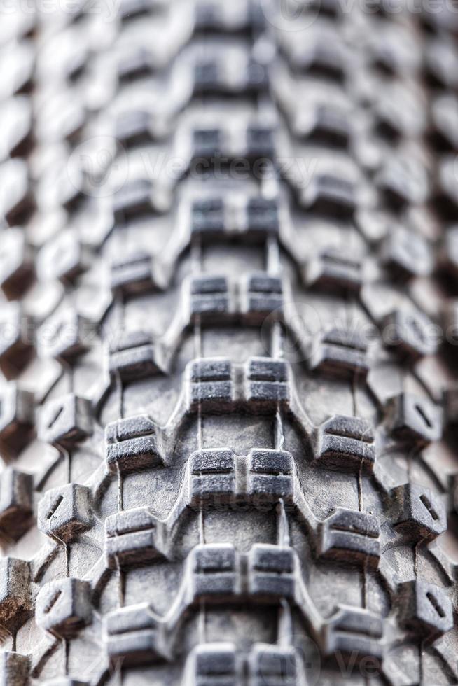 Bicycle wheel and tire close up on tread abstract. Macro photo