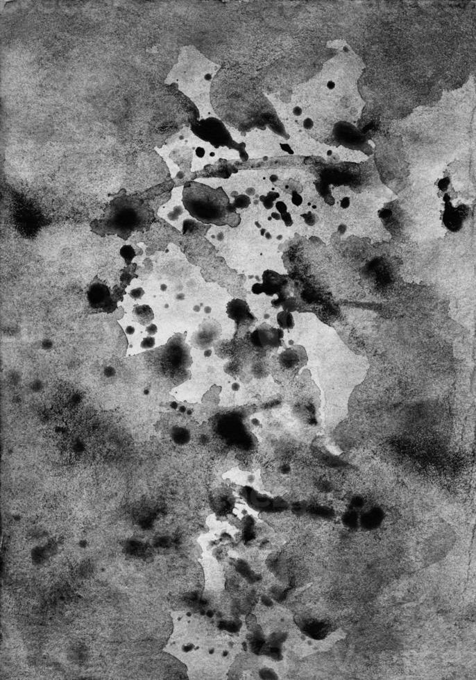 Watercolor old gray and black splash background texture. Watercolour black and white backdrop. Stains on paper photo