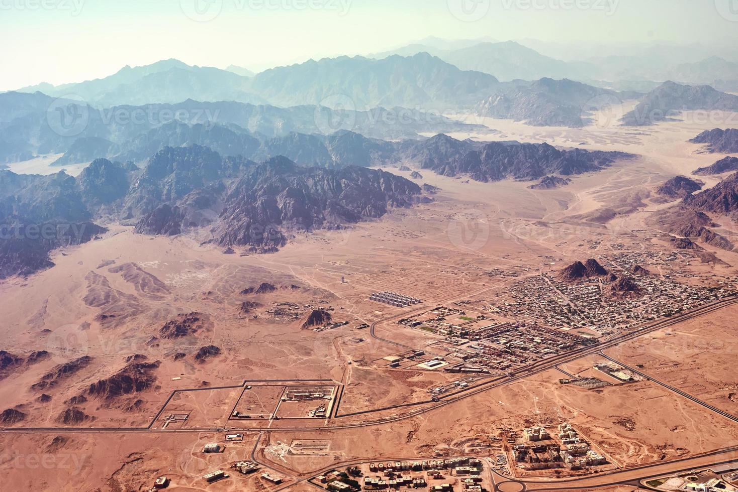 Aerial landscape view of a mountains and desert sand photo