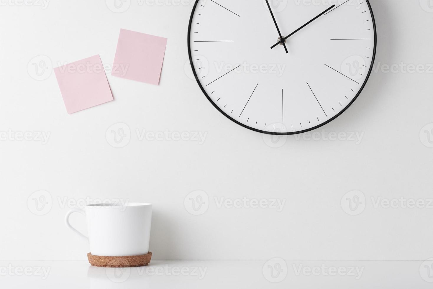 Home office minimal workspace desk with wall clock photo